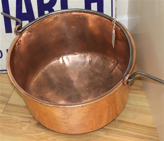 A 19th century copper cauldron